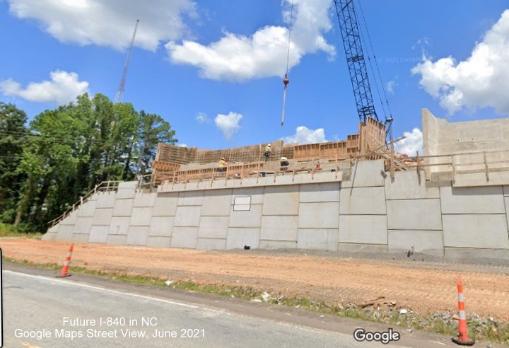 Image looking east from Lees Chapel Road at bridge under construction for future I-840/Greensboro Loop being constructed over roadway, Google Maps Street View image, June 2021