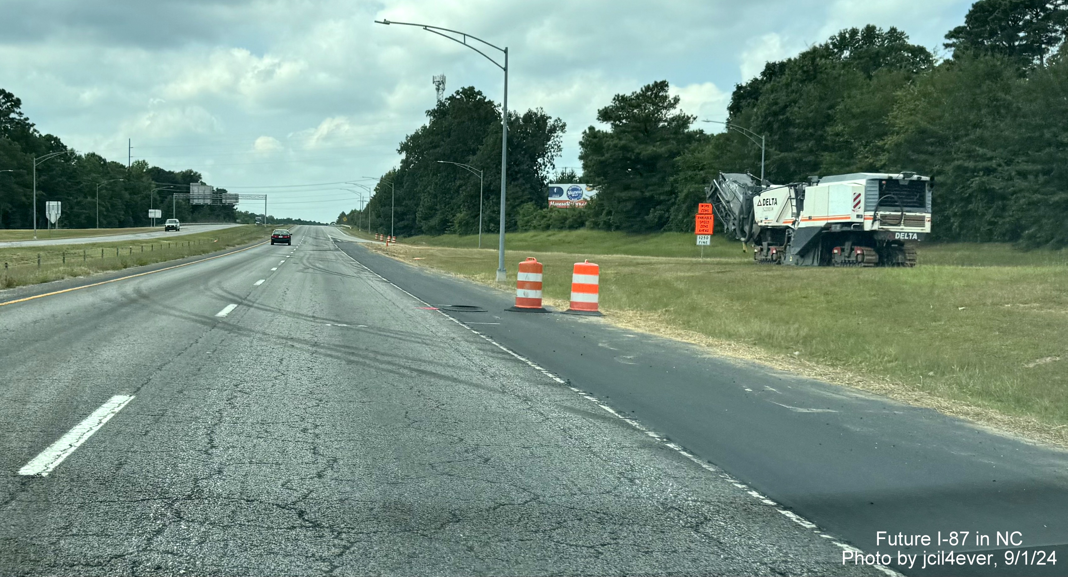 Image of widened right shoulder on US 64 West (Future I-87 South) after ramp from US 258, 
          by jcil4ever, September 2024