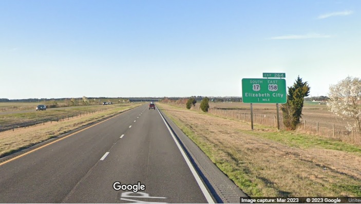 Image of 1/2 mile advance sign for South US 17/East US 158 exit on US 17 North/Elizabeth City Bypass, Google Maps Street View, March 2023