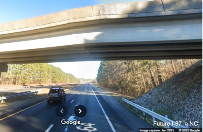 Image of start of interstate standard shoulders on US 64 East (Future I-87 North) after the
		  Thomas Road bridge in Rocky Mount, Google Maps Street View, January 2025