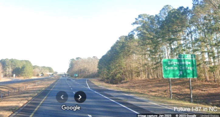 Image of widened shoulders on US 64 East (Future I-87 North) at exit sign
		for Edgecombe Community College (NC 121) exit, Google Maps Street View, January 2025