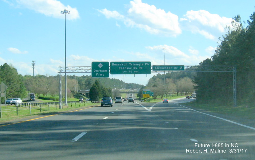 Image of overhead exit signage at the Alexander Dr exit on NC 147 (Future I-885) South in Research Triangle Park
