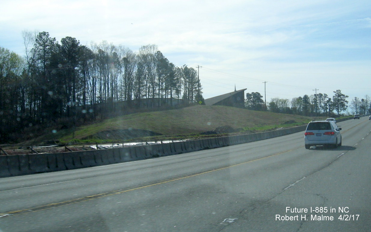 Image taken of new US 70 lanes merging with existing alignment as part of East End Connector project in Durham