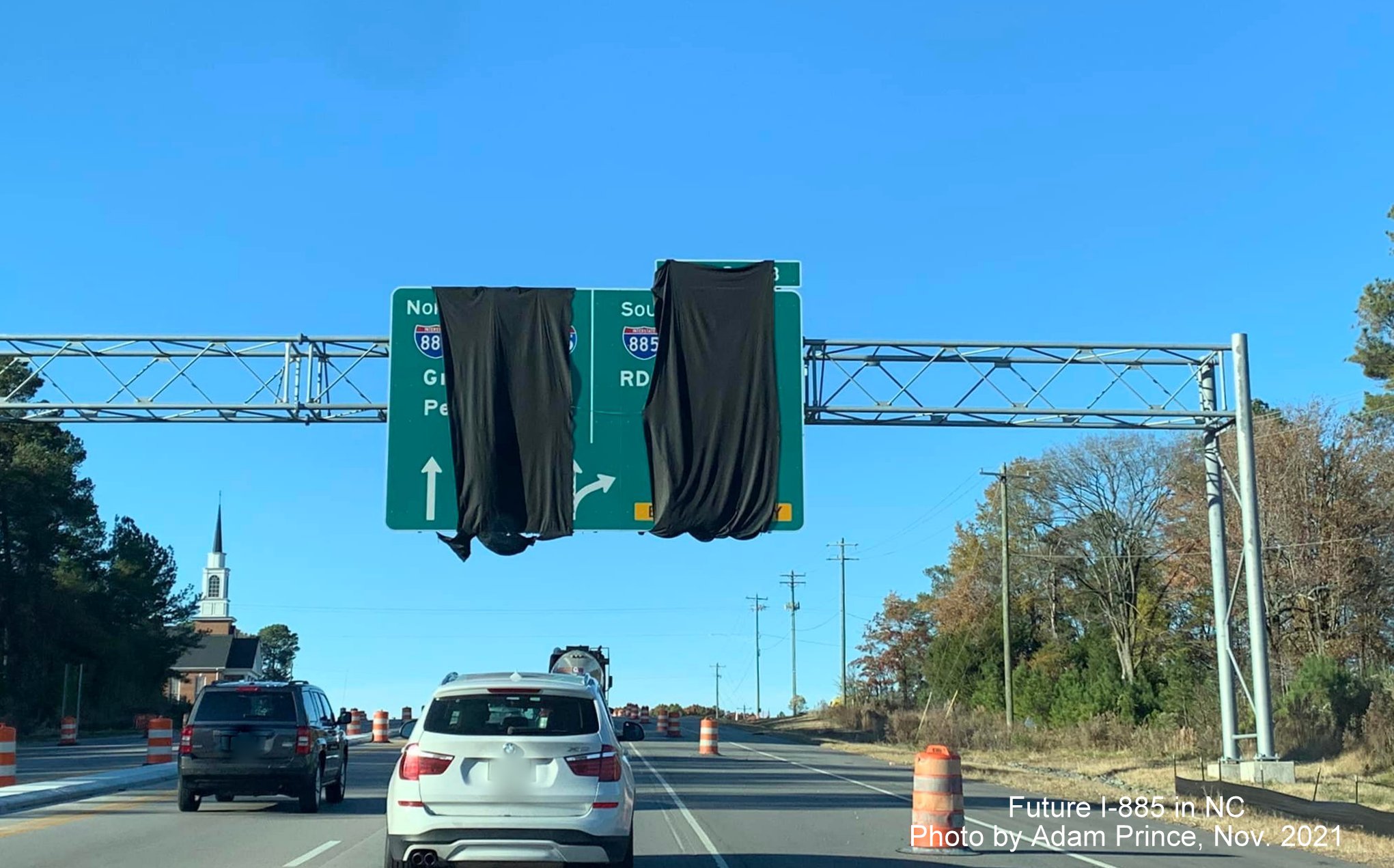 Image of covered over overhead signs awaiting opening of East End Connector on US 70 West in Durham, by Adam Prince November 2021