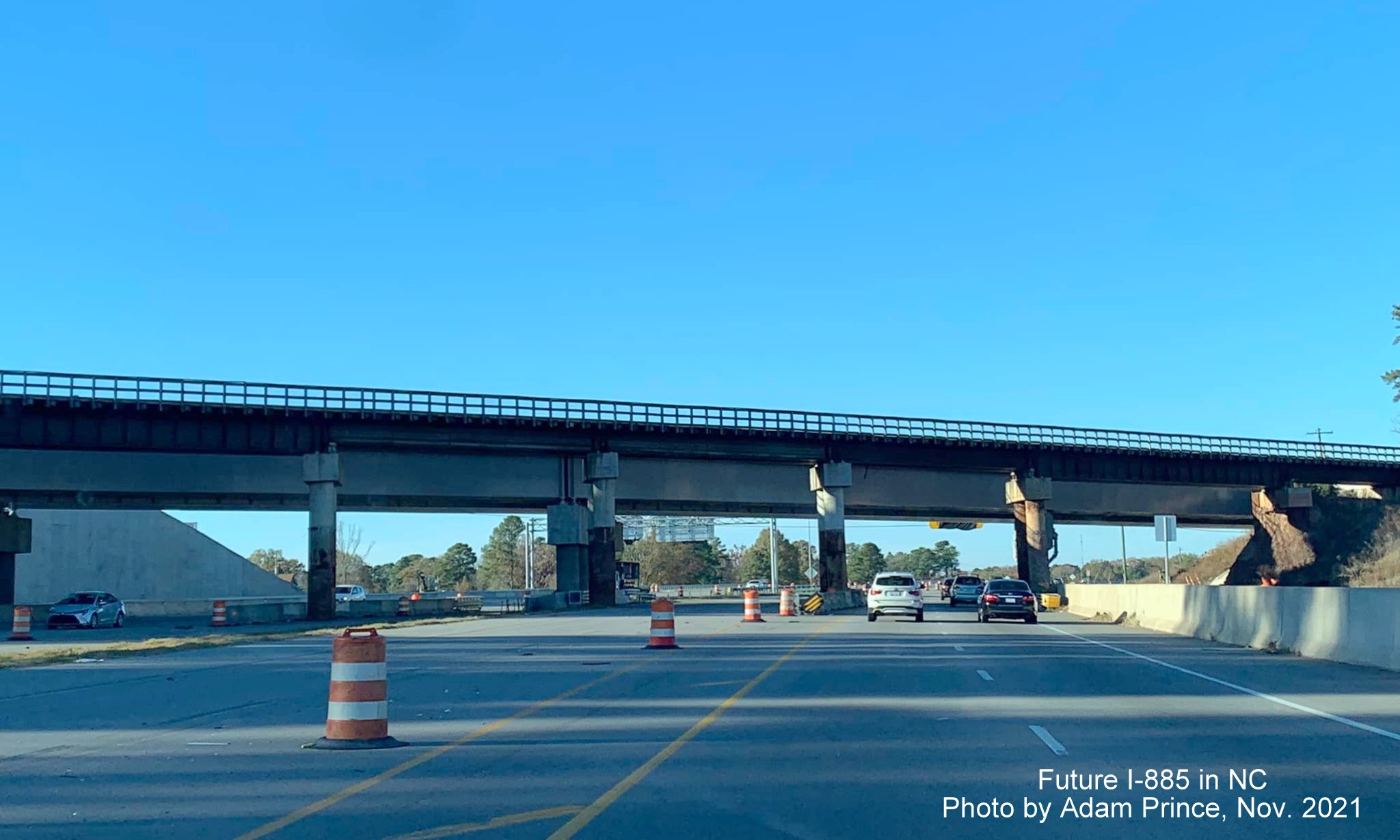 Image of covered over overhead signs awaiting opening of East End Connector on US 70 West in Durham, by Adam Prince November 2021