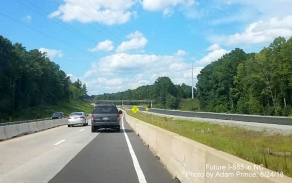 Image of NC 147 Durham Freeway traffic using temporary lanes while future lanes are being reconstructed prior to future East End Connector interchange, by Adam Prince