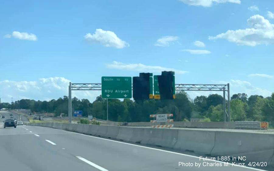 Image of recently placed overhead gantry for signs for Busines US 70/NC 98 and US 70 East in Durham, by Charles M. Kunz, April 2020
