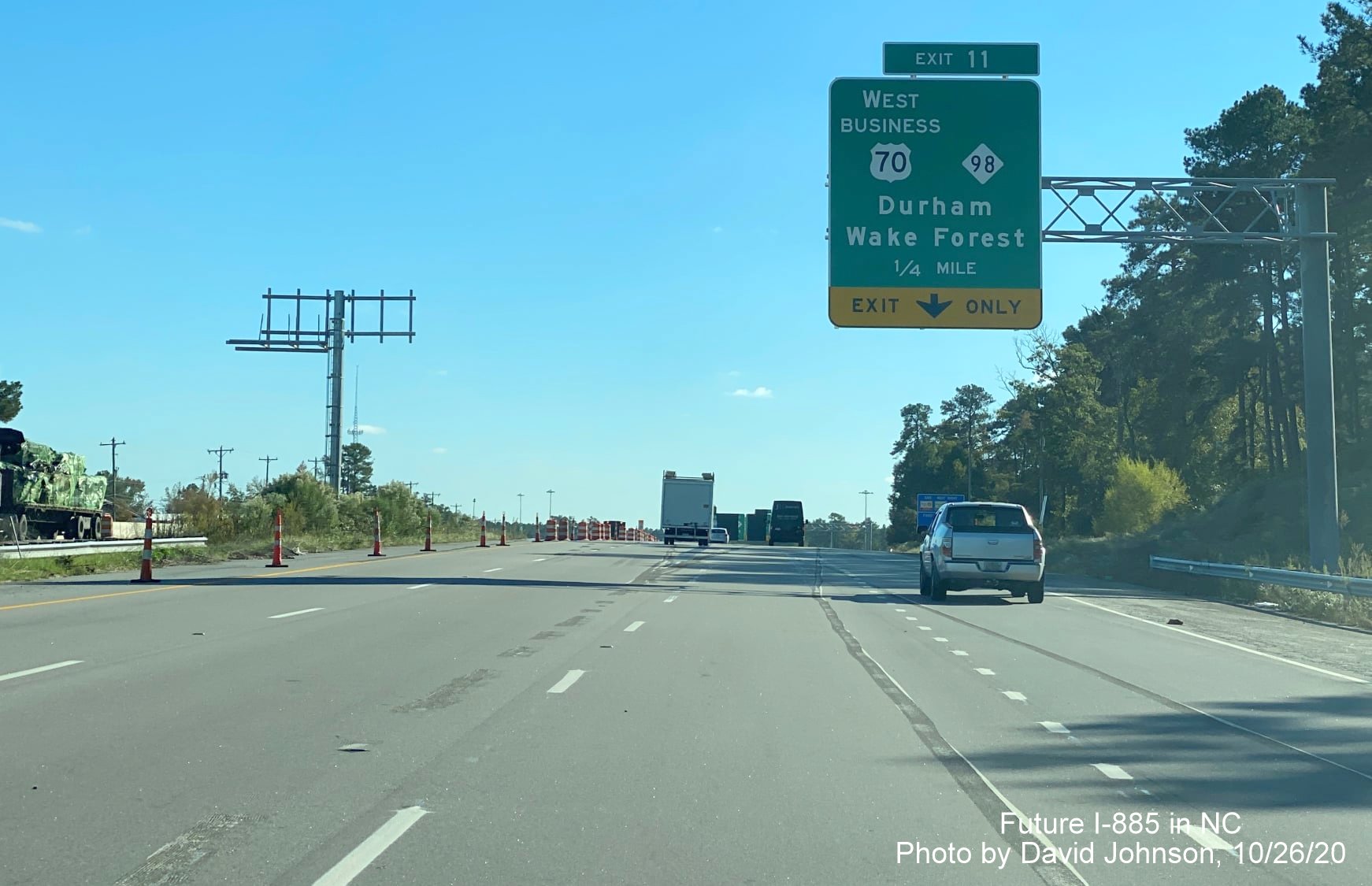 Image of 1/2 mile advance overhead sign for West Bus, 70/NC 98 exit with I-885 exit number on US 70 East in Durham, by David Johnson October 2020