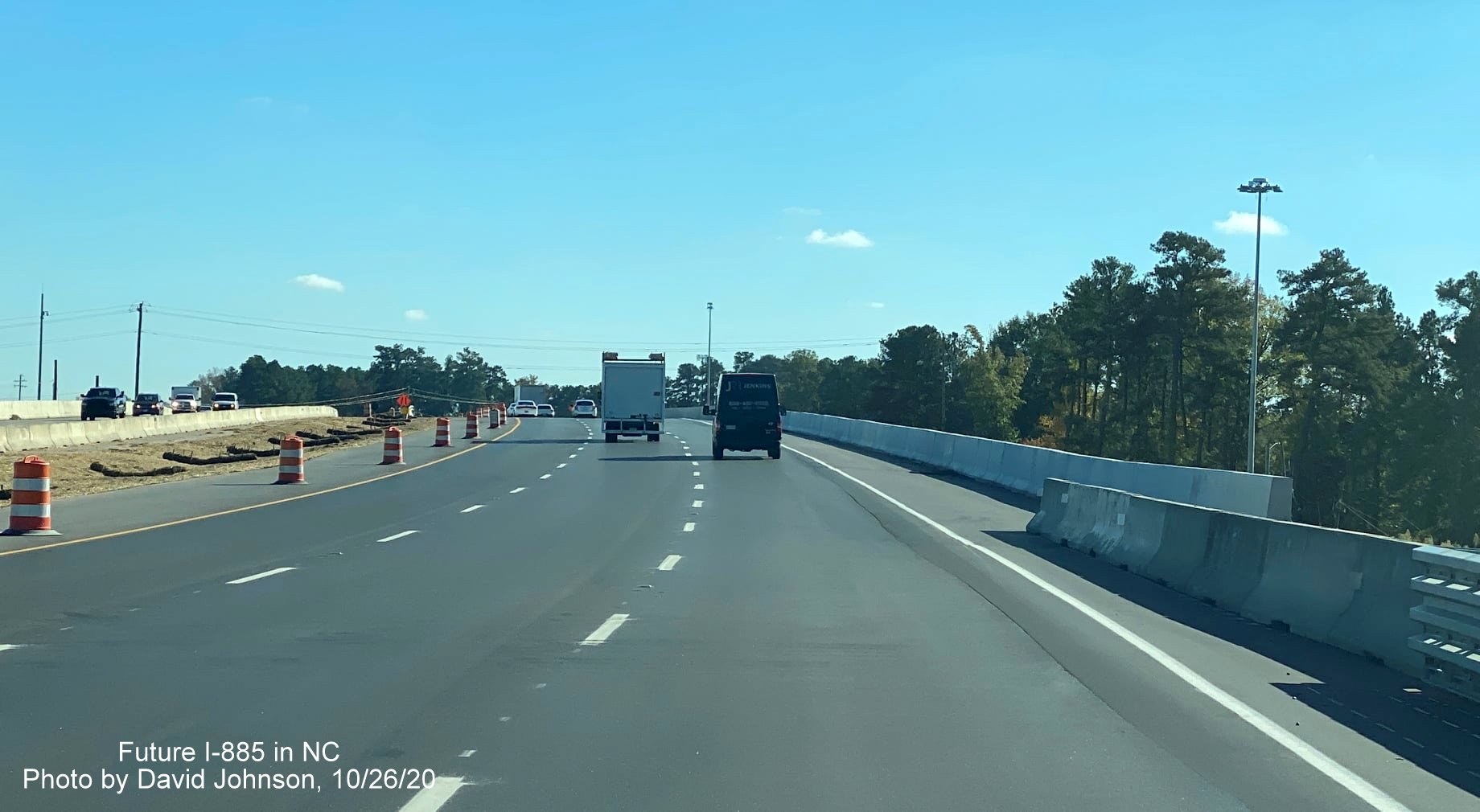 Image of traffic on newly opened US 70 East (Future I-885 South) lanes approaching bridge over Business 70/NC 98 in Durham, by David Johnson October 2020