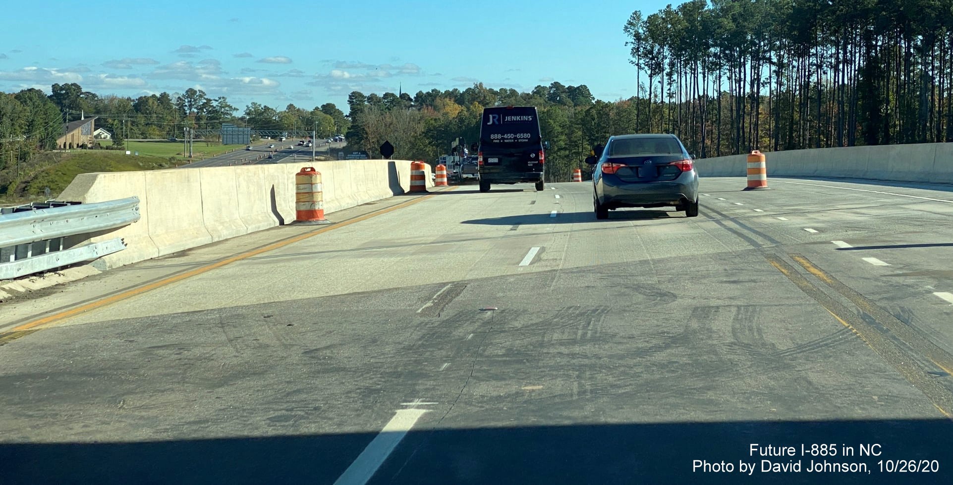 Image of traffic on future US 70 east exit ramp from I-885 South heading over bridge over I-885 North East End Connector in Durham, by David Johnson October 2020