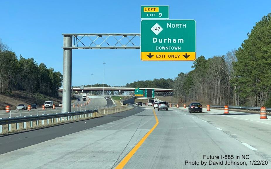 Image of newly placed 1/4 mile advance overhead sign for NC 147 exit on Future I-885 North in Durham, by Davd Johnson