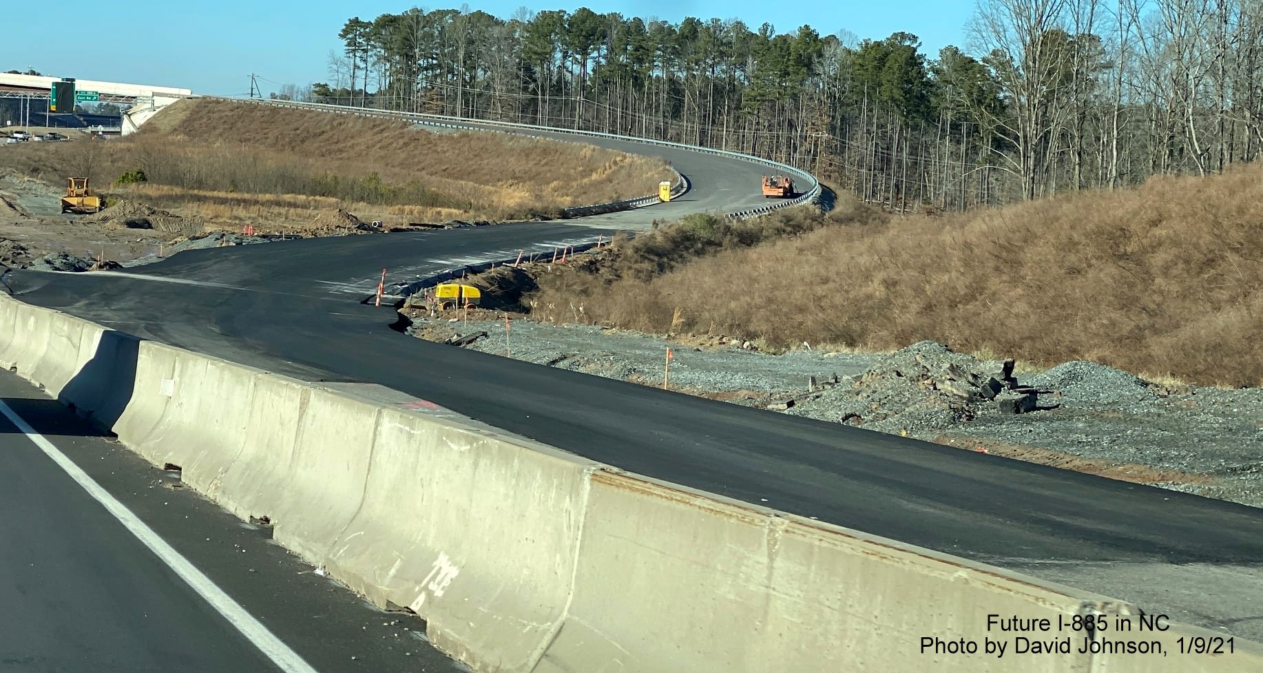 Image of newly paved connection between completed flyover ramp to Future I-885 South East End Connector from US 70 West in Durham, by David Johnson, January 2021