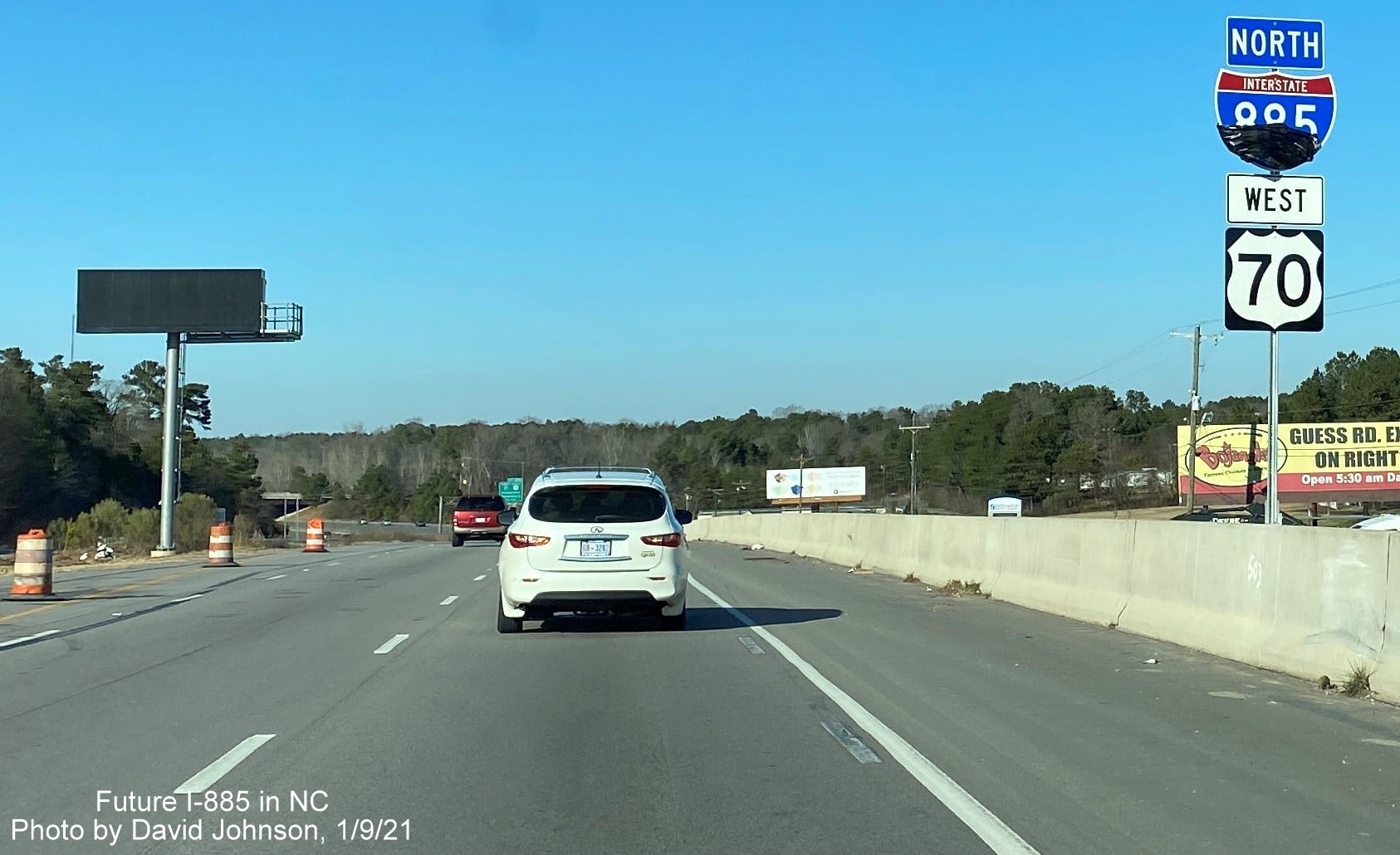 Image of newly placed partially covered I-885 North/US 70 West reassurance marker in Durham, by David Johnson, January 2021