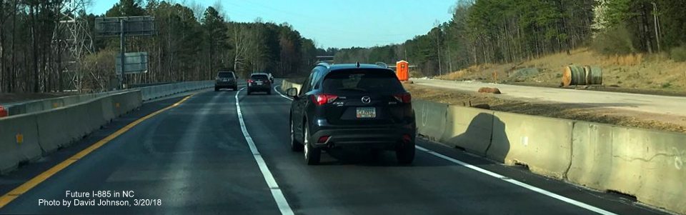 Image of NC 147 North traffic using crossover to temporary lanes approaching East End Connector project in Durham, by David Johnson