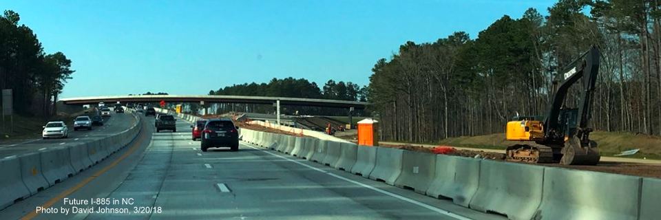 Image of NC 147 traffic using temporary lanes approaching East End Connector project in Durham, by David Johnson