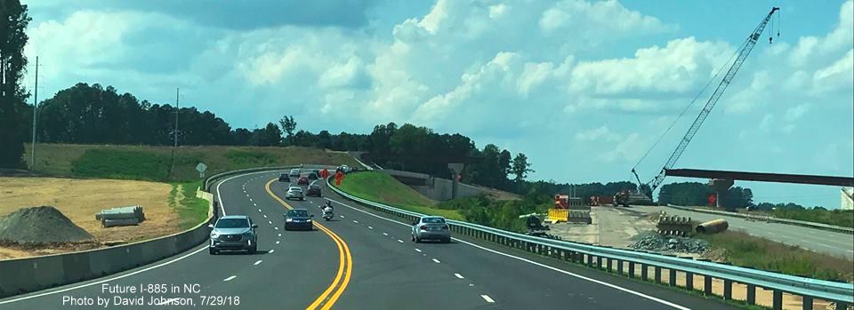 Image of US 70 heading west along new roadway to left of future I-885 interchange with US 70 at East End Connector project in Durham, by David Johnson