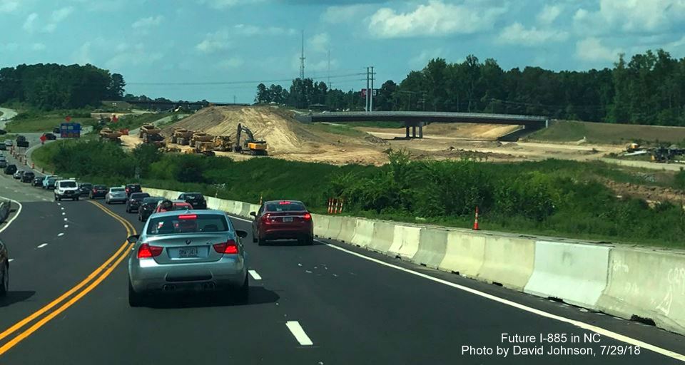 Image of US 70 West traffic paralleling future I-885 freeway roadway north of East End Connector interchange in Durham, by David Johnson