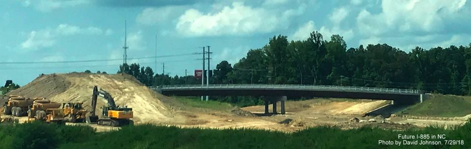 Image of completed bridge over future I-885/US 70 lanes north of East End Connector interchange in Durham, by David Johnson
