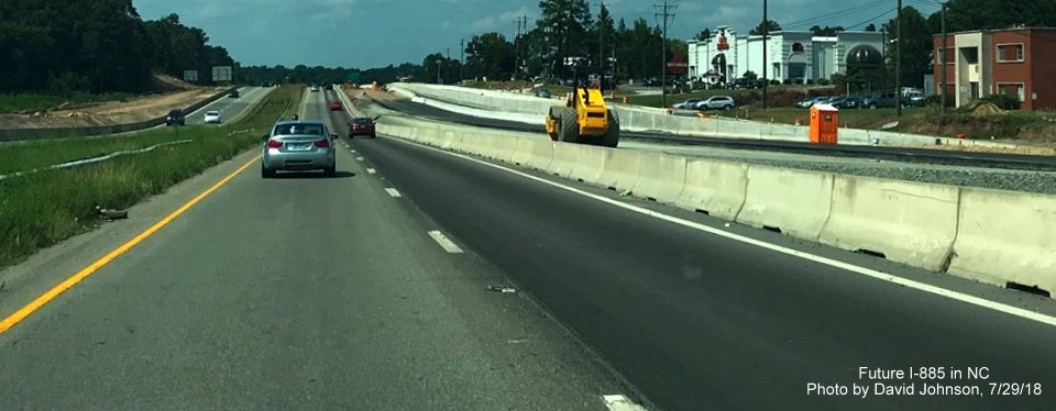 Image of future I-885 lanes under construction to the right of current US 70 as part of East End Connector project in Durham, by David Johnson