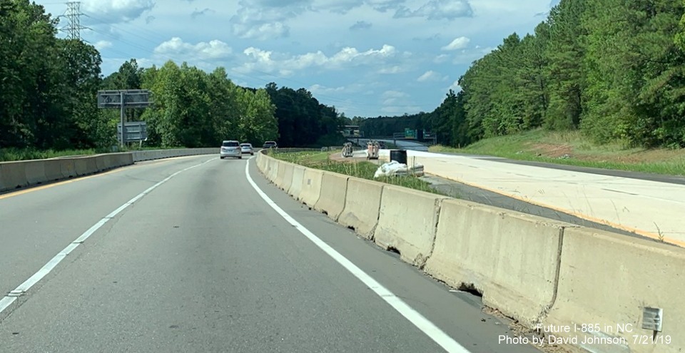 Image of NC 147 traffic shifting to temporary lanes at start of East End Connector Project work zone in Durham, by David Johnson