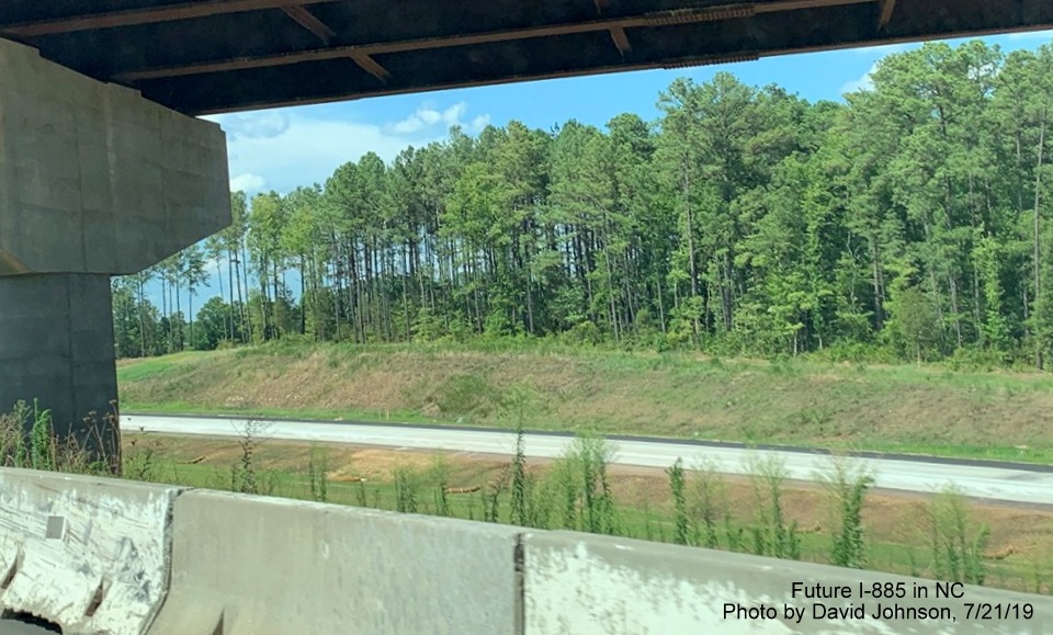 Image of future on-ramp to NC 147 North from I-885 South under I-885 North flyover ramp in East End Connector Project work zone in Durham, by David Johnson