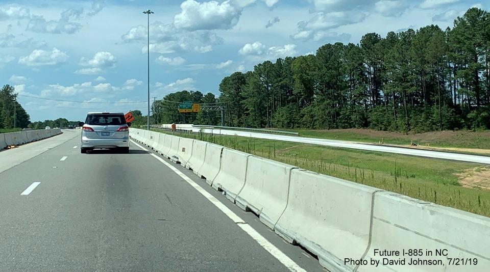 Image of view of Future NC 147 North lanes from temporary lanes in East End Connector Project work zone in Durham, by David Johnson