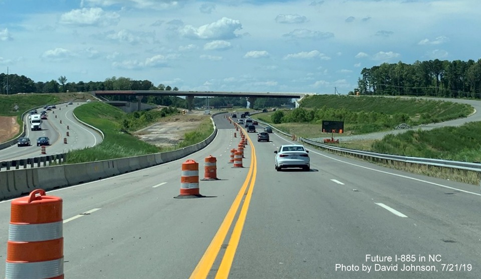 Image of lane markings for future US 70 traffic on future US 70 west lanes in East End Connector Project work zone in Durham, by David Johnson