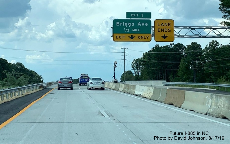 Image of recently placed 1/2 mile advance sign (with wrong exit number?) for Briggs Avenue exit on NC 147 North in Durham, by David Johnson