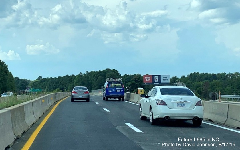 Image of NC 147 traffic rejoining original lanes prior to the Briggs Avenue exit in Durham, by David Johnson