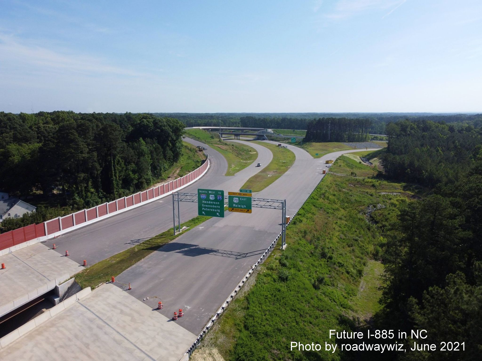 Image taken looking closely at the unopened I-885/East End Connector US 70 interchange in Durham, by roadwaywiz, June 2021