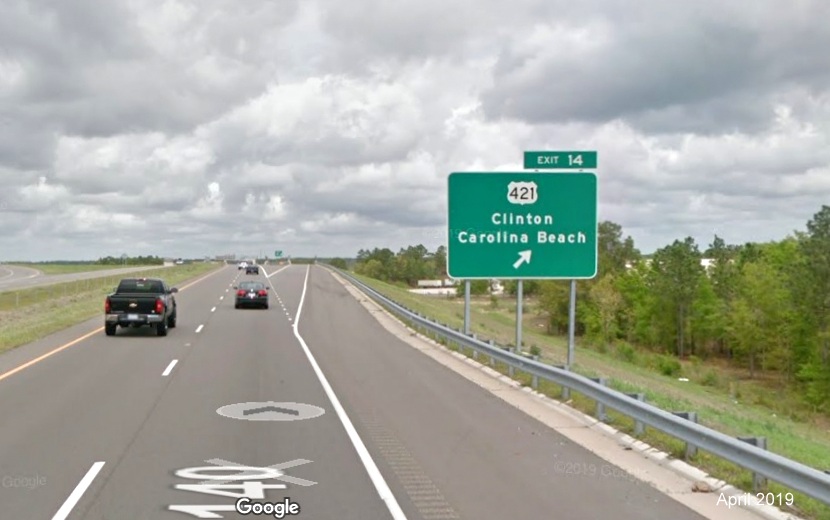 Google Maps Street View image of ground mounted ramp sign for US 421 (No longer with US 17 South) exit on I-140 
                                      East in Wilmington, taken in April 2019