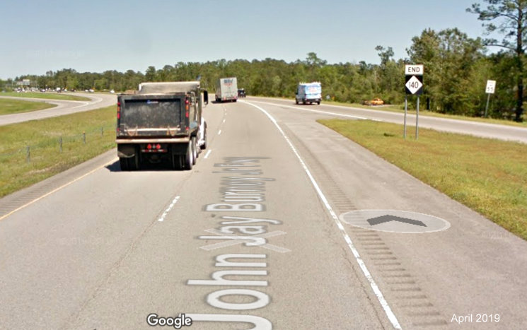 Google Maps Street View image of End NC 140 trailblazer approaching US 17 North in Scott's Hill, taken in
                                        April 2019
