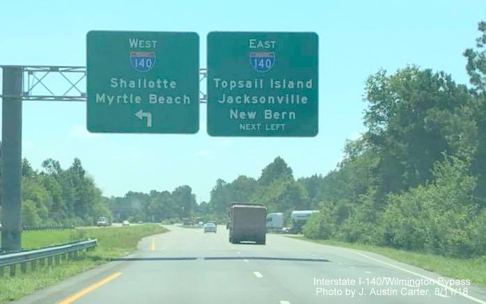 Image of overhead signage for I-140/Wilmington Bypass on US 74/76 West, by J. Austin Carter