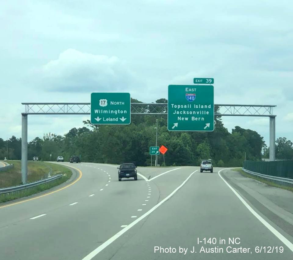 Image of overhead signage at exit ramp to I-140 East on US 17 North southwest of Wilmington, by J. Austin Carter
