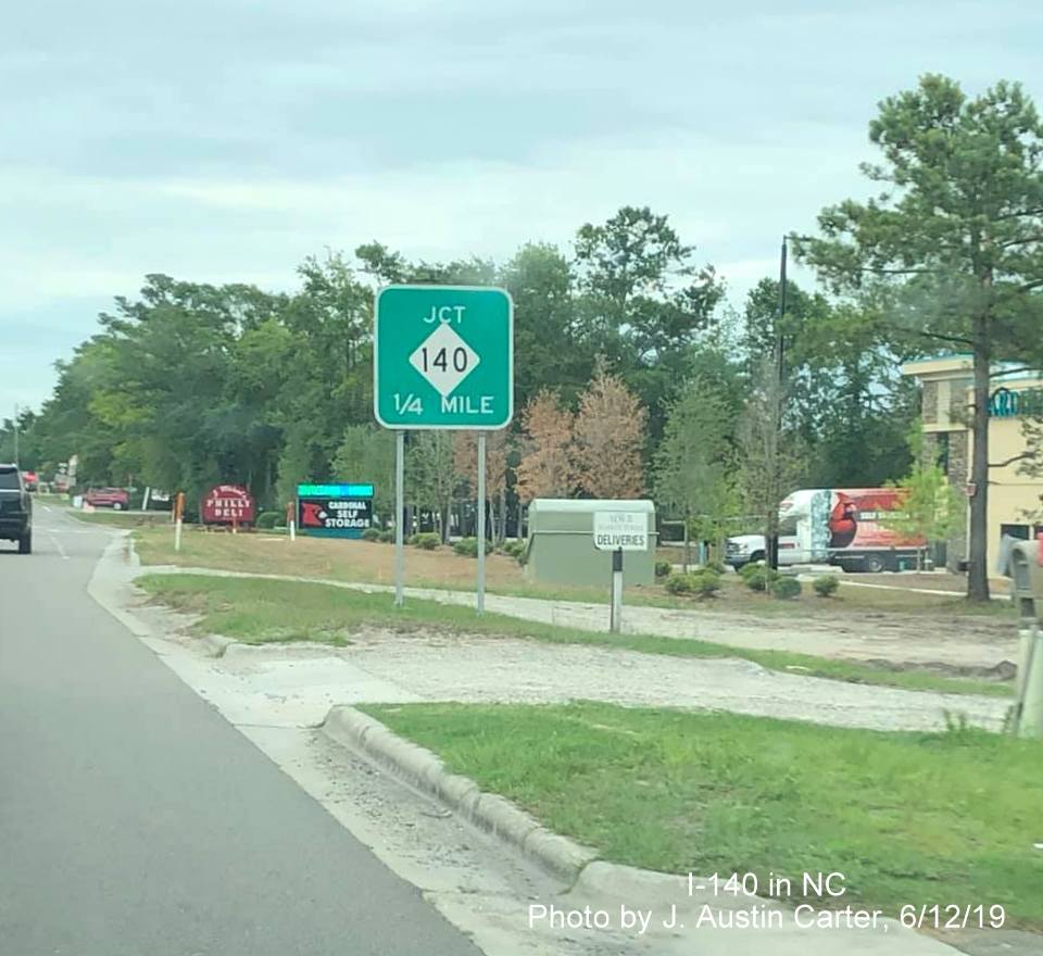 Image of ground-mounted Junction NC 140 sign on US 17 South in Scotts Hill, by J. Austin Carter