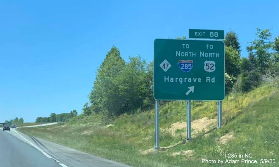 Image of newly placed ground mounted exit sign for NC 47 on I-85 South in Lexington with new I-285 shield and text, by Adam Prince, May 9, 2020