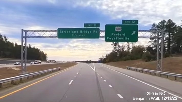 Image of overhead signage on I-295 South at US 401 exit after final section was opened in 
	 November, screen grab from Benjamin Wolf Video, December 2025