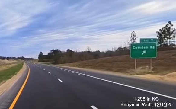Image of ground mounted 1 mile advance sign for the Camden Road exit on newly opened 
	 section of I-295 South, screen grab from Benjamin Wolf Video, December 2025