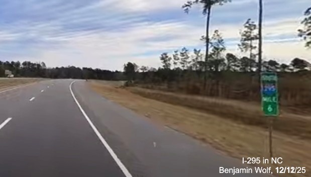 Image of newly updated mile 6 marker now with I-295 shield after the Camden Road exit 
	 on I-295 South, screen grab from Benjamin Wolf Video, December 2025