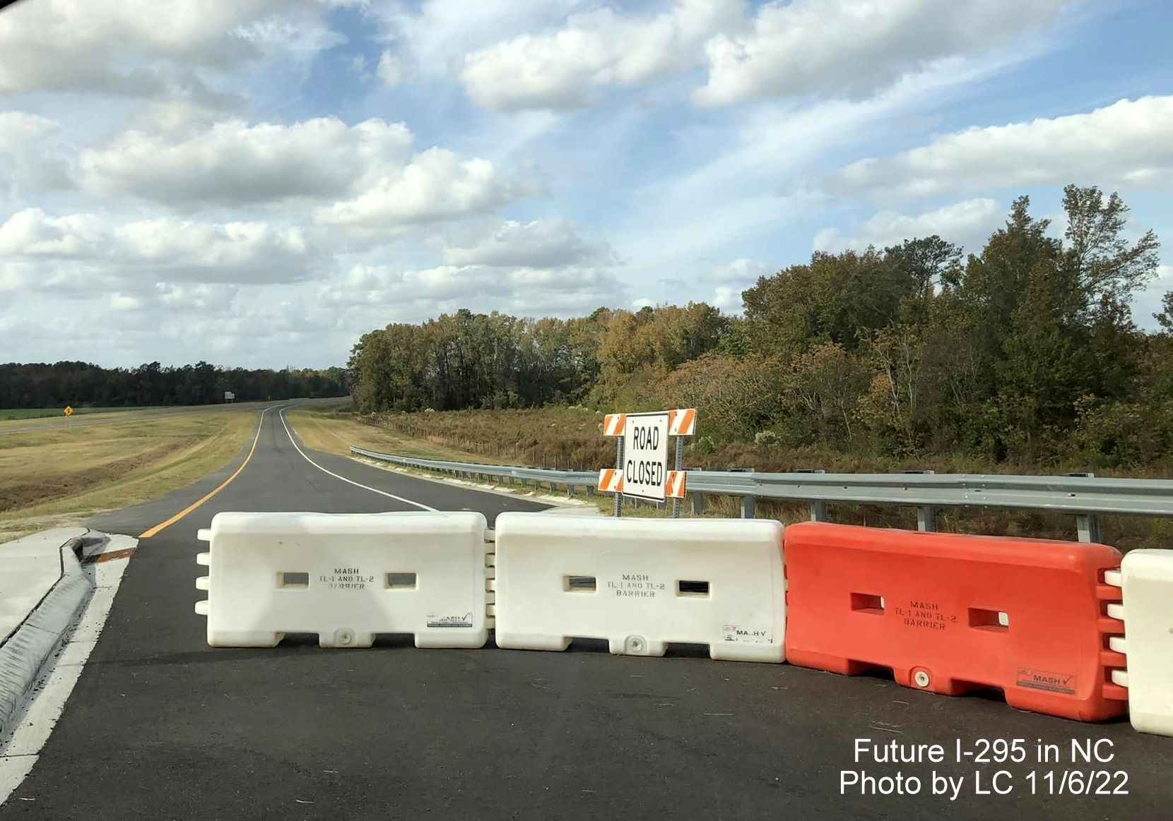 Image of view looking west from Parkton Road roundabout to soon to be opened ramp to 
                                                 Fayetteville Outer Loop north to Black Bridge Road, by LC, November 2022