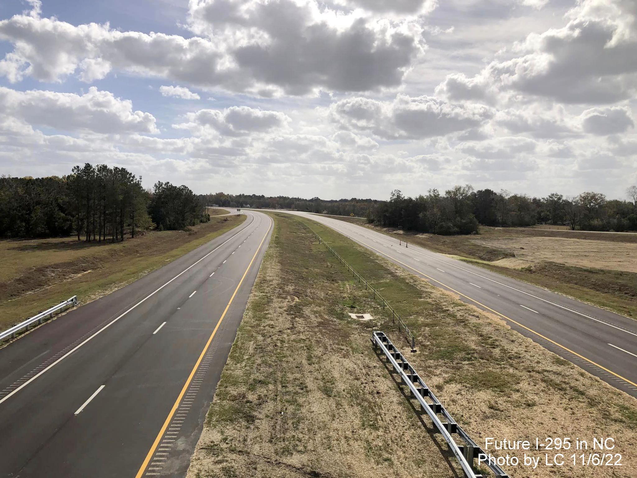Image taken along Black Bridge Road bridge looking south to soon to
        be opened section of Fayetteville Outer Loop to Parkton/Leeper Roads, by LC, November 2022