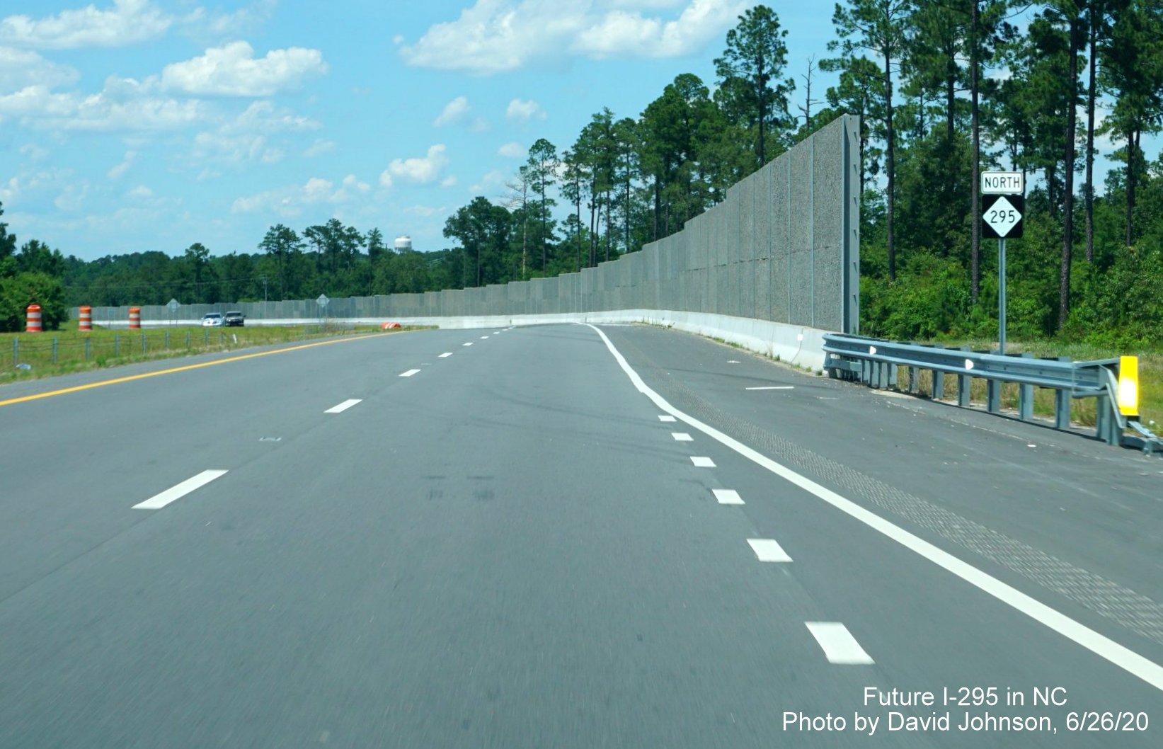 Image of first NC 295 reassurance marker and noise wall north of Cliffdale Road exit, by David Johnson 
        June 2020
