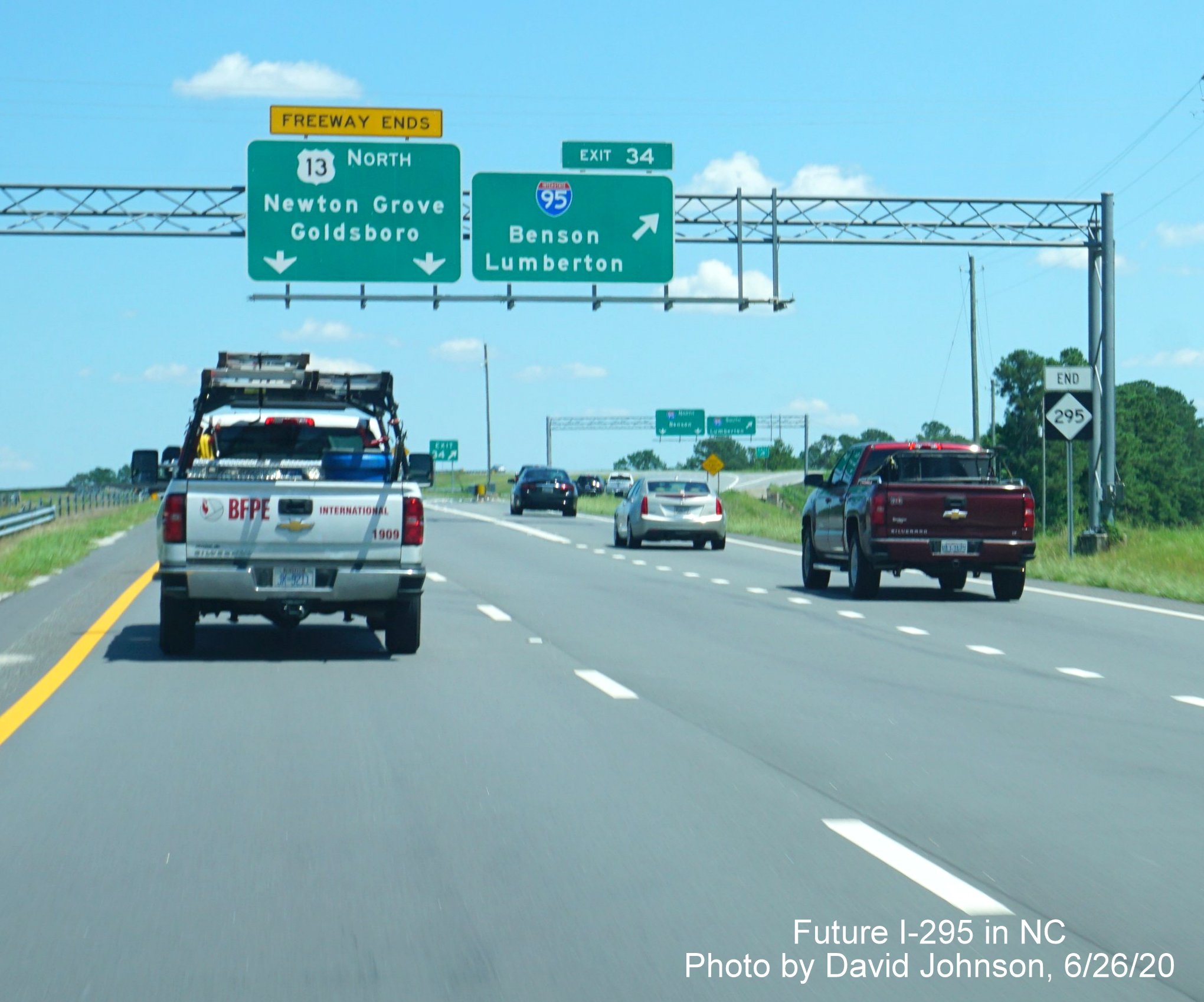 Image of overhead signage at I-95 exit ramp on I-295 North, including end NC 295 trailblazer, by David Johnson June 2020