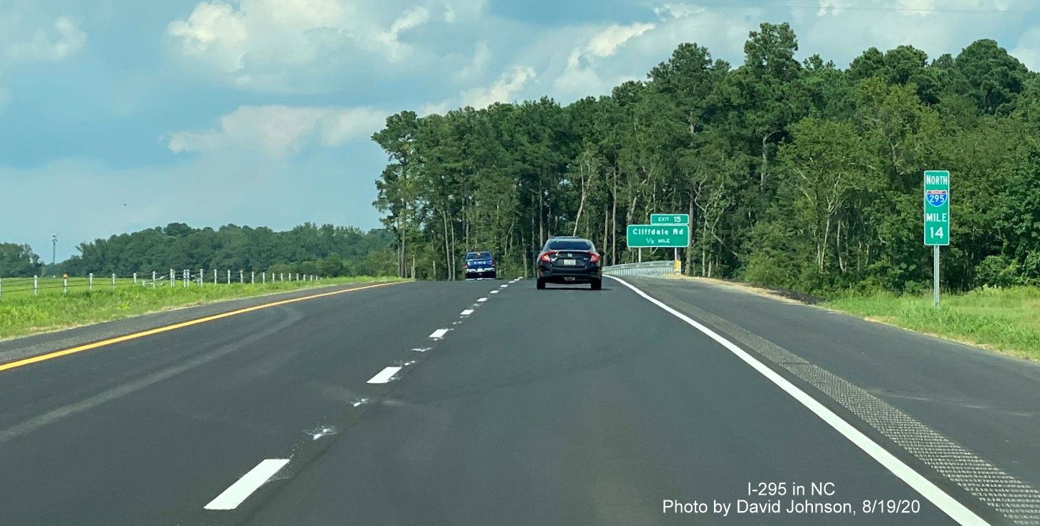 Image of Mile 14 marker before 1/2 Mile advance ground mounted sign for Cliffdale Road exit on newly opened section of North 
        I-295 in Fayetteville, photo by David Johnson August 2020