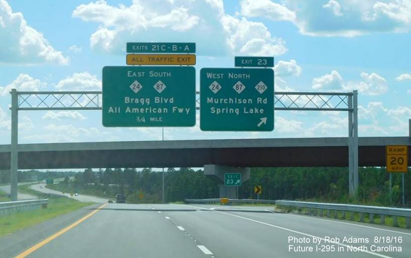 Image of 1-Mile Advance sign for Bragg Blvd/NC 24 East/NC 87 South exit on newly opened section of Fayetteville Outer Loop, photo by
        Rob Adams