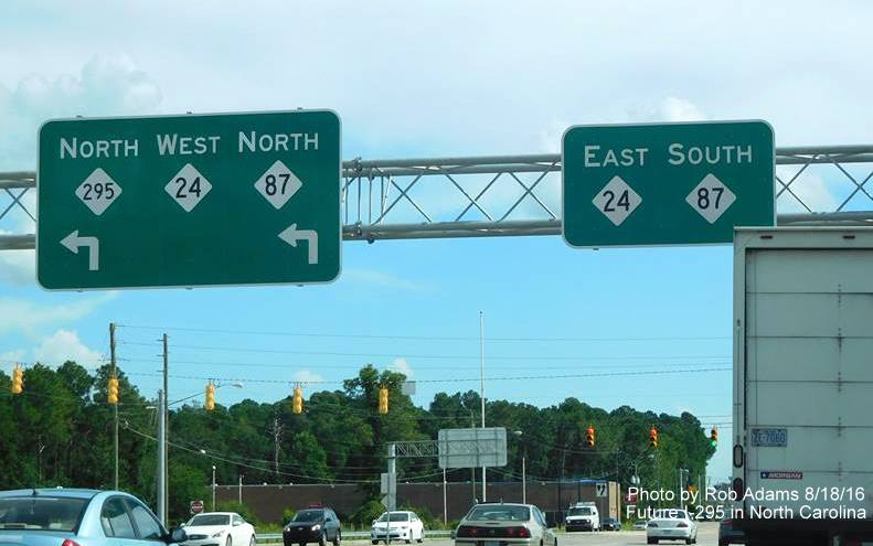 Image of overhead guide signage along Bragg Blvd for Fayetteville Outer Loop, now with NC 295 shield, from Rob Adams
