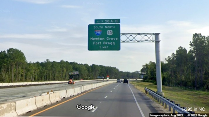 Image of new 1 Mile advance overhead sign for I-295 South/US 13 North exit on I-95 North in Parkton, Google 
        Maps Street View, August 2023
