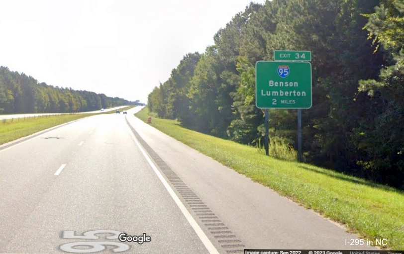 Image of ground mounted 2 miles advance sign for I-95 exit on I-295 North, Google Maps Street View, 
        September 2022