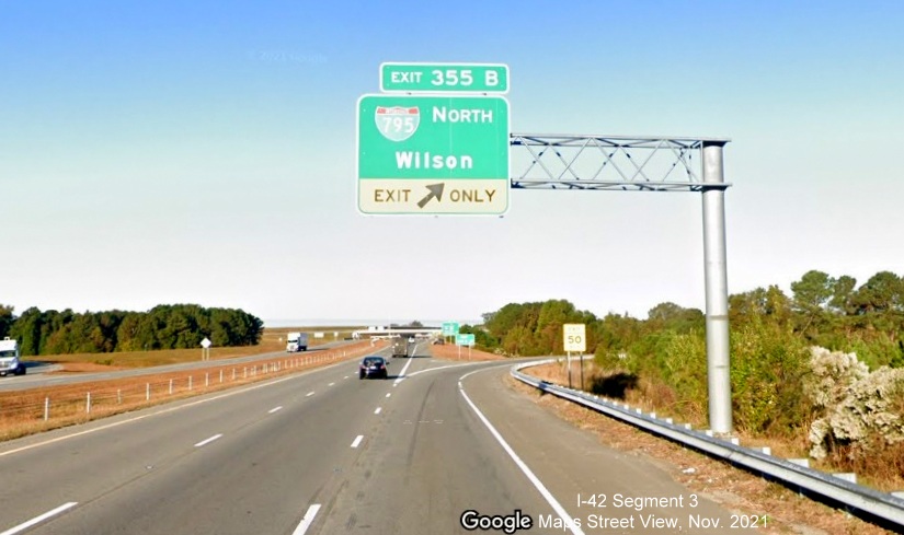 Image of overhead ramp sign for I-795 North exit on US 70 Bypass West around Goldsboro, Google Maps Street View image, November 2021