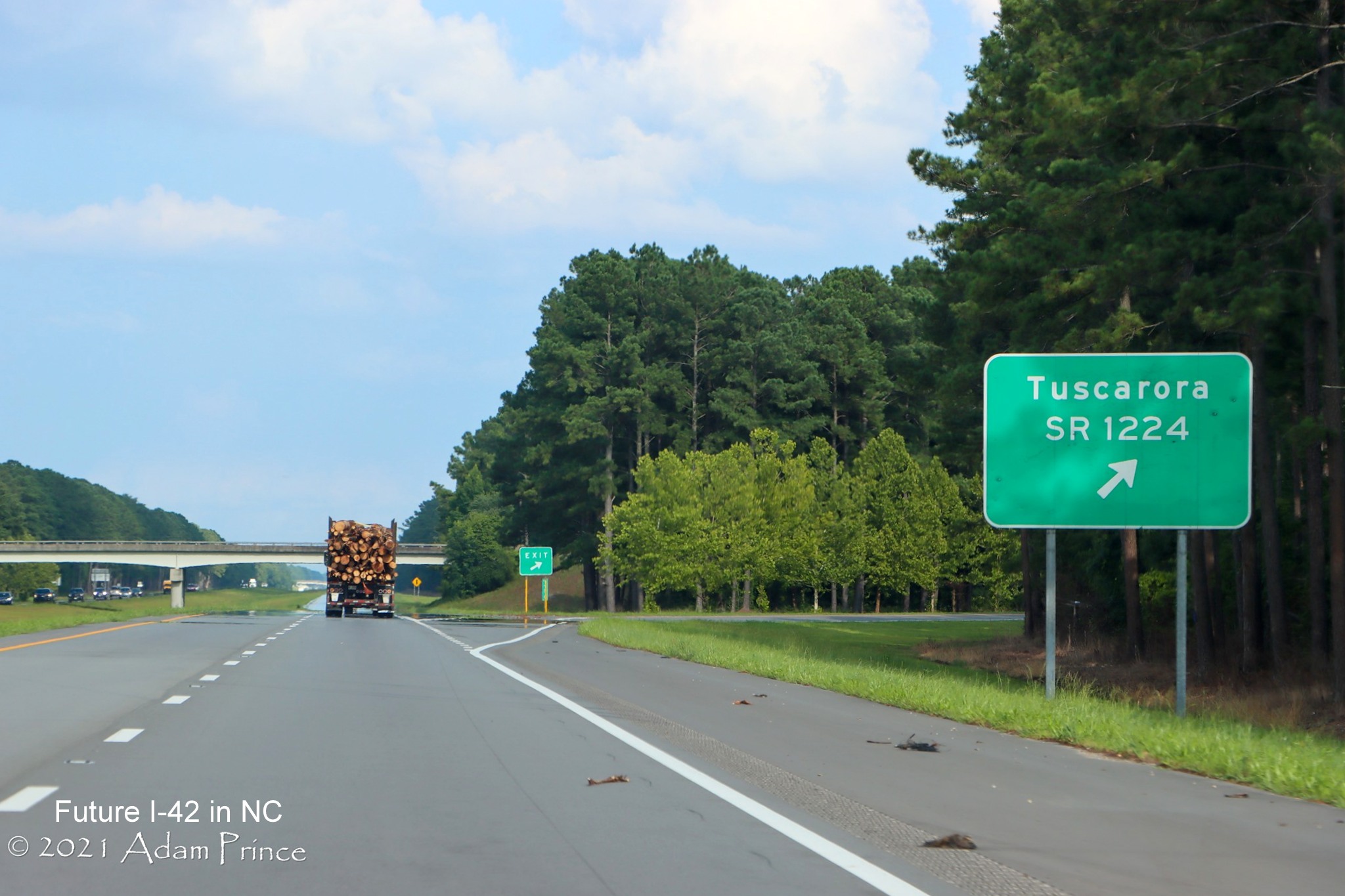 Image of SR 1224 exit sign along newly widened right shoulder of US 70 (Future I-42) East near Tuscarora, photo by Adam Prince, July 2021